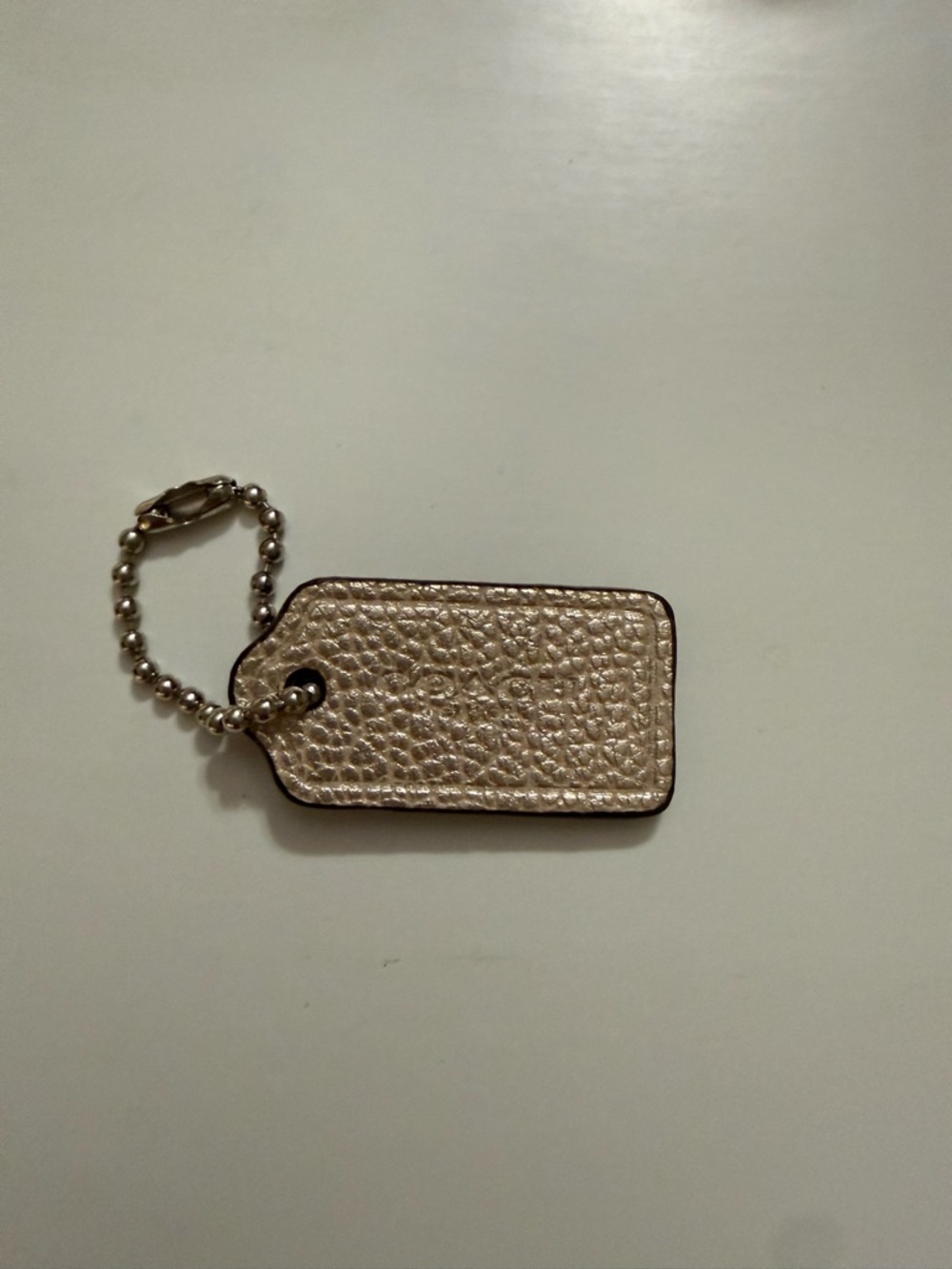 Coach Metallic Beige Leather Tag Keychain
